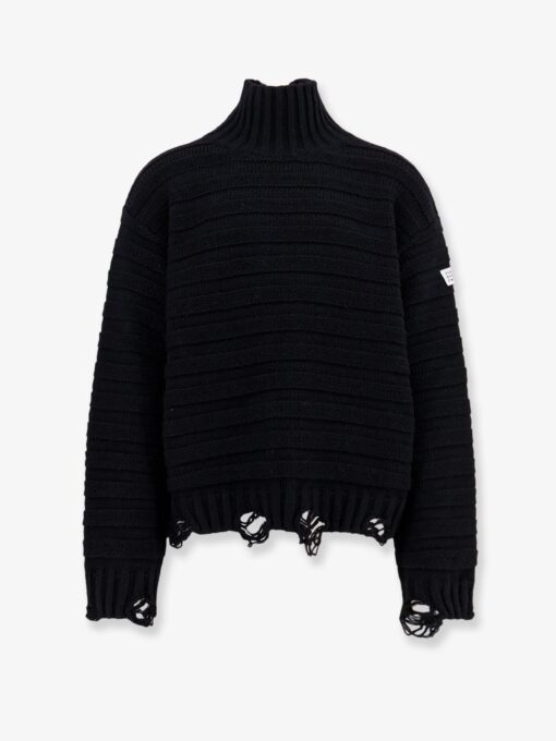 Wool blend sweater with distressed effect