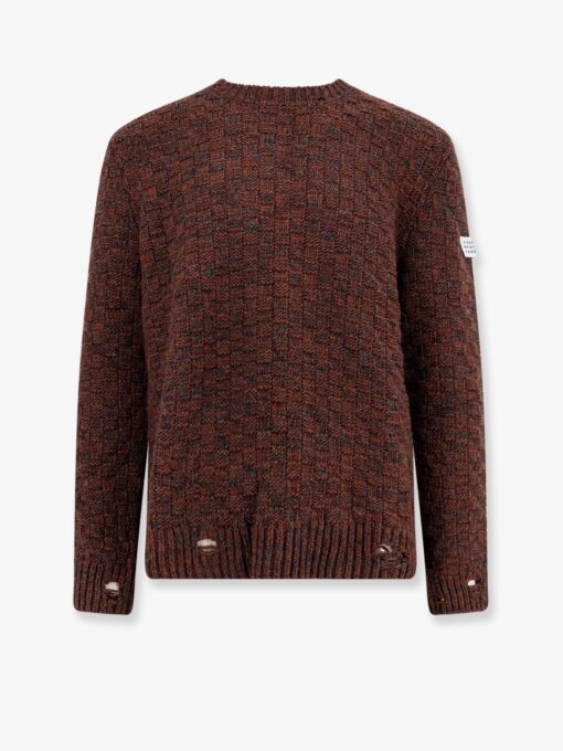 Wool blend sweater with distressed effect