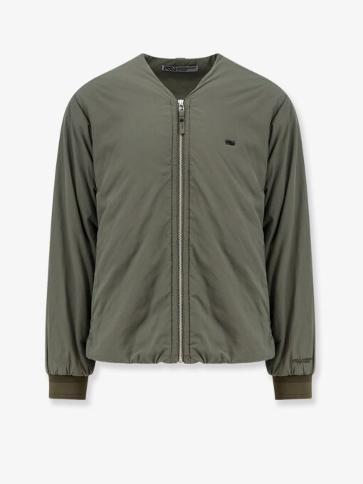 Nylon jacket with metal logo patch on the front