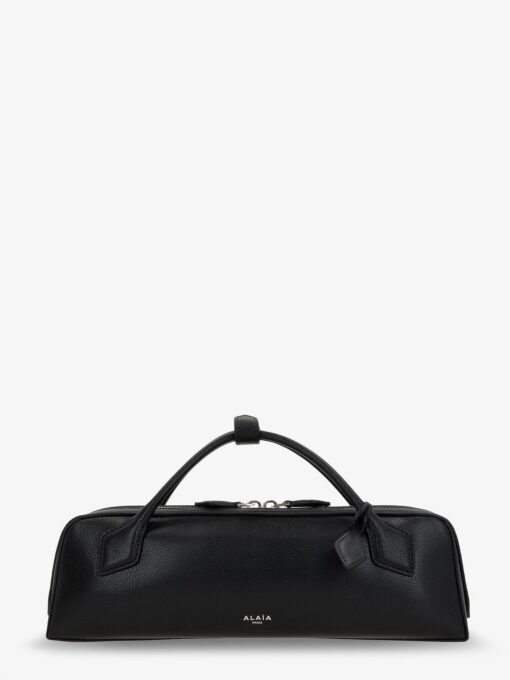 Le Teckel suede clutch bag