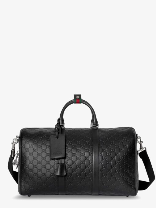 Coated canvas GG Emblem travel bag with GG motif