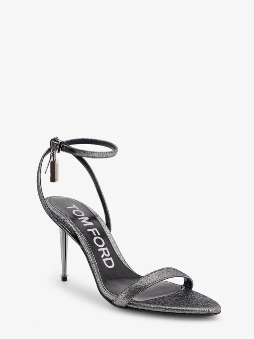 Laminated heeled sandals with laminated effect